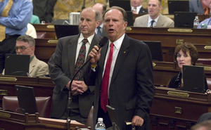 State Rep. William Adolph, R-Delaware, speaks on the floor of the Pennsylvania House yesterday in Harrisburg during a debate over the state's budget.