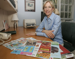 Coupon-clipper Stephanie Nelson of Marietta, Ga., owns the site the Coupon Mom. Hits tripled this year, to about 25,000 a day. "People are seeking out ways to save money," she said. "Coupons are free money, if it's something you would buy anyway."