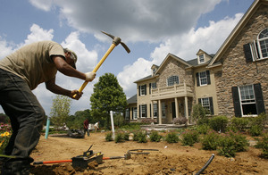 Work continues on a model unit at The Estates at Garnet Valley, in Glen Mills. It's one of several developments whose locations are a key factor in achieving good sales in a sluggish market.
