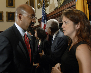 New commission member Cynthia Figueroa speaking with Mayor Nutter after yesterday's news conference. Figueroa is the executive director of Women Against Abuse.