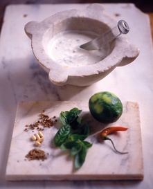 Put the food processor away: For sweeter garlic and flavorful herbs, pick up the mortar and pestle.
