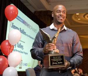 Phillies shortstop Jimmy Rollins, the 2007 National League MVP, holds the Wanamaker Award at last night's ceremonies.