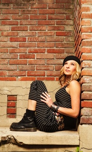 Sharon Little went from serving up dinner to serving up songs as the opening act for Robert Plant and Alison Krauss, at the Mann on Saturday .