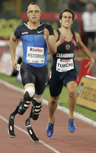Double amputee Oscar Pistorius of South Africa competes with Italy's Teo Turchi in the 400 meters at a meet in Rome. He placed seventh, again failing to qualify for the Olympics.