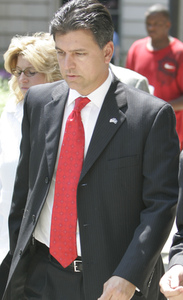State Sen. Robert Regola was acquitted by a jury in a gun case involving his son and a suicide. B2.