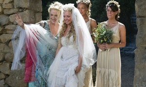 Meryl Streep (left) as Donna, the mother of Sophie, who is played by Amanda Seyfried (center), in the ABBA musical-turned-movie, "Mamma Mia!" Rachel McDowall and Ashley Lilley (right) play Sophie's friends.