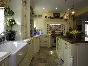 The kitchen, with English country touches, designed by Danielle McDonald of Colmar Kitchen & Bath.