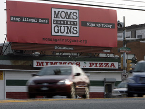 A Moms Against Guns billboard at 30th Street and Allegheny Avenue. The group has 27 citywide, with more promised. "Everybody has a power: The power to vote," said a MAG official.