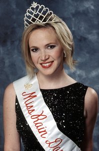 Angela Bertugli as Miss Rain Day 2001. She's still on the state payroll.