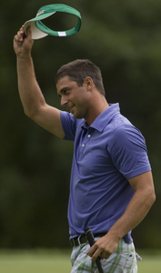 Gregory Pieczynski tips his visor after his first win as a pro at the Philadelphia Open. "It just felt like a matter of time until I did win something," he said.