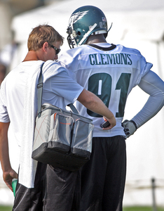 Chris Clemons has his temperature checked between drills.