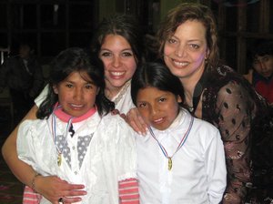 Writer Carolann Costa (right) with two schoolgirls and a fellow Globe Aware volunteer in Peru.