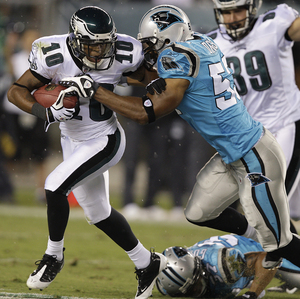 Rookie DeSean Jackson tries to elude Na'il Diggs on first-quarter punt return.
