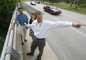 Removing a mile of Virginia Drive in the Fort Washington Office Park and relocating buildings would be "pretty radical" but makes sense, says Jeffrey Featherstone of Temple University's Center for Sustainable Communities. With him are Mahbubur Meenar and Andreea Ambrus.