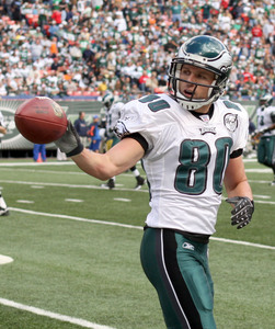 Kevin Curtis tosses ball after scoring 75-yard TD vs. Jets last season.