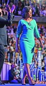 Obama in Denver, devoted and demure.