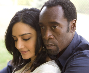 Archie Panjabi, Don Cheadle in the millen-nial thriller marred by too much talk.