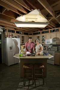 Paul and Julianne Gablin in the kitchen they are remodeling. In the midst of the project, they learned Wachovia was canceling the home-equity line of credit they used to pay for the work.