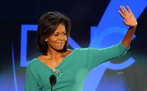 Michelle Obama, at the convention on Monday, got the luxuriant look to her hair without using chemicals, says a spokeswoman for her stylist.