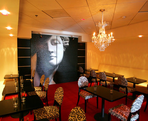 Privé has a sleek look provided by the wife of one of the owners. It includes a spotlit mural and cut white stone. The restaurant is in the Market Street spot formerly occupied by Lena and Bluezette.