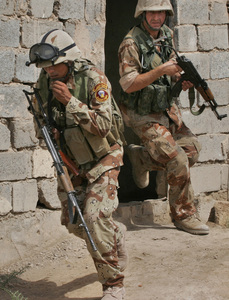 Iraqi army soldiers during a raid to search for weapons in a house in Youssifiyah, southof Baghdad in Iraq. U.S. and Iraqi officials have alleged that the Iranians use members of Lebanon's Shiite movement Hezbollah to train Iraqi Shiite extremists.