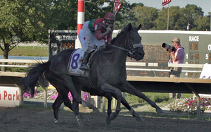 Jockey Joe Bravo has Anak Nakal home first in the Pennsylvania Derby.