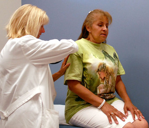 In the Showboat casino , Carmen Filippello gets a checkup from Sharone Jensen at a clinic serving Harrah's employees.