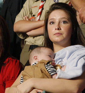 Bristol Palin, 17, holding her brother Trig on Friday, is five months pregnant. The daughter of vice presidential candidate Sarah Palin intends to have the baby and marry the father.