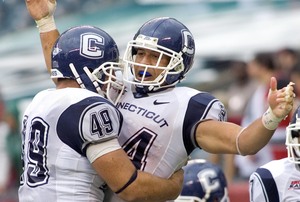 Donald Brown (right) scored in overtime.