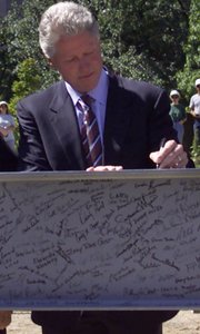 President Clinton signing a beam during groundbreaking ceremonies for the National Constitution Center on Sept. 17, 2000.