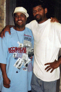 Miles Mack, with friend Wendell Zellars (right), was "all about the kids."