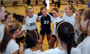 Captains Danielle Carrozza (20) and Kristina Purcell (23) pump up Merion Mercy for a game against Villa Maria.