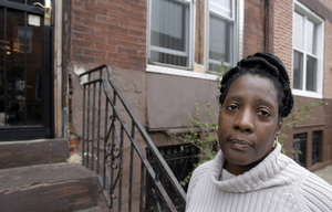 Philadelphia's foreclosure program helped Tania Harrigan, 53, of South Philadelphia, keep the deed to her home and lower her monthly mortgage payments. Consumer and housing advocates have said a program like the city's should be part of the $700 billion bailout of the U.S. financial industry.
