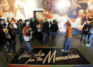 Fans take a trip down memory lane along the Spectrum concourse during Flyers preseason game.