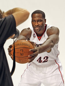New Sixers forward Elton Brand strikes a pose at team's media day session.