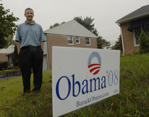 Martin Geiger stands with his Barack Obama campaign sign on the lawn of his Springfield, Delaware County, home.