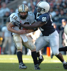 Purdue QB Curtis Painter was thrown for a loss by the Lions' Tamba Hali in 2005. Painter is on pace to set several records.
