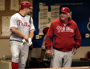 Charlie Manuel shares light moment with winning pitcher Joe Blanton during 6-2 win in NLDS Game 4.
