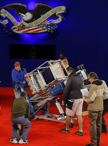 Stagehands work on the set for the second presidential debate,to be held tonight at Belmont University in Nashville.