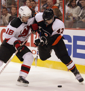Speedy Luca Sbisa, working against the Devils' Nicklas Bergfors, is only 18 years old, but the defenseman's play has impressed Flyers officials.