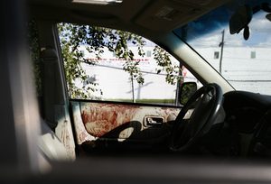 The interior of the vehicle that Thomas Timko was driving when he was shot Sunday. He remained in critical condition last night.