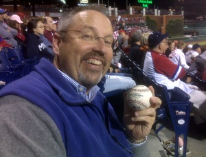 "I kind of clenched it and tucked it into my gut," said John Reilly of Wayne, who caught Shane Victorino's grand-slam ball in a scrum Thursday at the Bank.