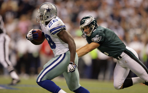 Rookie Felix Jones sprints past David Akers en route to 98-yard kickoff return touchdown earlier this season.