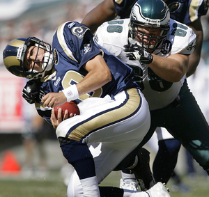 Dan Klecko (right) was signed as a fullback in the off-season, then was moved to defensive tackle. Yesterday, he was moved back to the offense on a more permanent basis.
