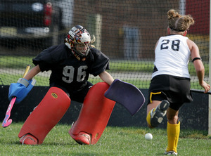 Gateway's Cate Cusack (left) is challenged by Haddonfield's Meghan Johnston for control of the ball. The Bulldogs' stifling defense held Gateway to one shot on goal in the game.