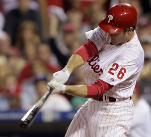 Chase Utley connects with the first pitch he sees in the sixth for a game-tying, two-run homer. Pat Burrell homered soon after.