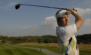 Kennett senior Christine Shimel can drive a golf ball 250 yards. Her coach, John Griffith, calls Shimel the core of the team.