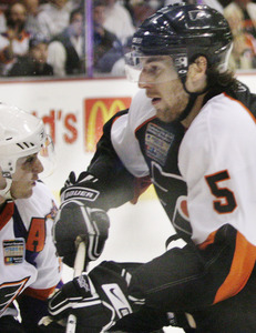 Braydon Coburn (right) says the Flyers have six defensemen "that any team would be comfortable with."