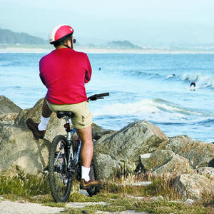 Biking at Half Moon Bay, where there's a fall festival that sounds like a Midwest county fair.