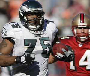 Juqua Parker outruns 49ers quarterback J.T. O'Sullivan on interception return for touchdown.